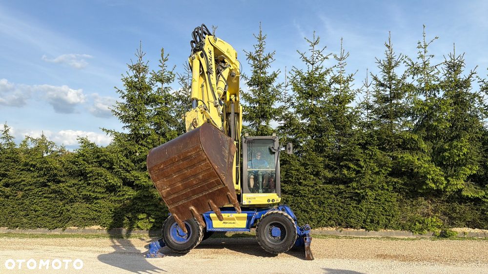 Mecalac Koparka 14 ton MECALAC 15 MWR koparko-ładowarka 3 łyżki widły 1 wł Centr.smarowanie Opony na BLIŹNIAKU 80%Camso ładowarka 714 12MTX 4x4 skrętne KLIMA kabina Premium silnik 146KM volvo EW140B DEUTZ szybka 35km/h - 31