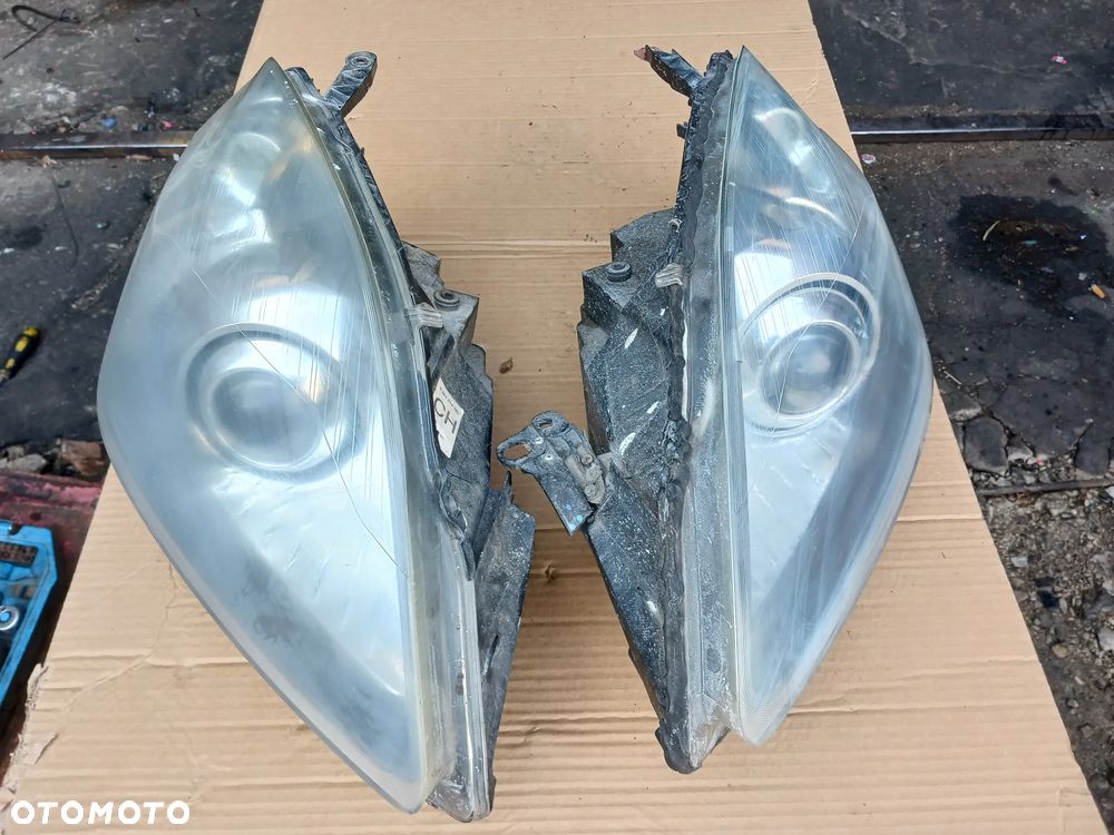 Lampa Przednia Prawa Lewa Opel Zafira B Bi-Xenon Skrętny EU KOMPLET 24451045RH 24451044LH