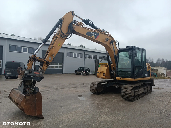 Caterpillar 311 D koparka gąsienicowa
