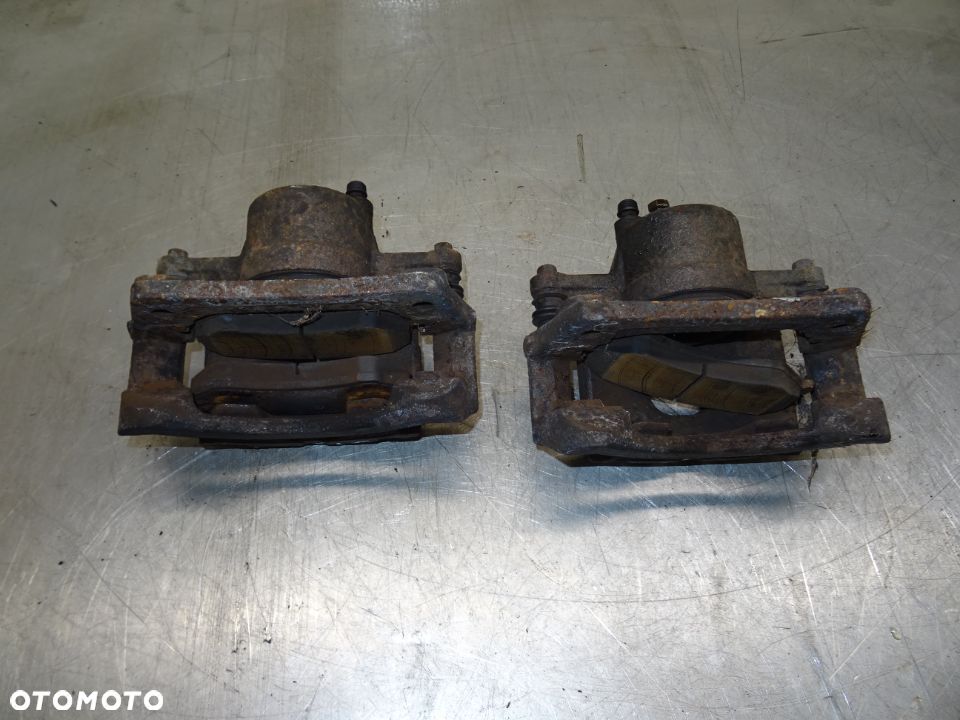 JEEP CHEROKEE KJ LIBERTY 01-05 3.7 ZACISK LEWY PRZÓD PRZEDNI - 4