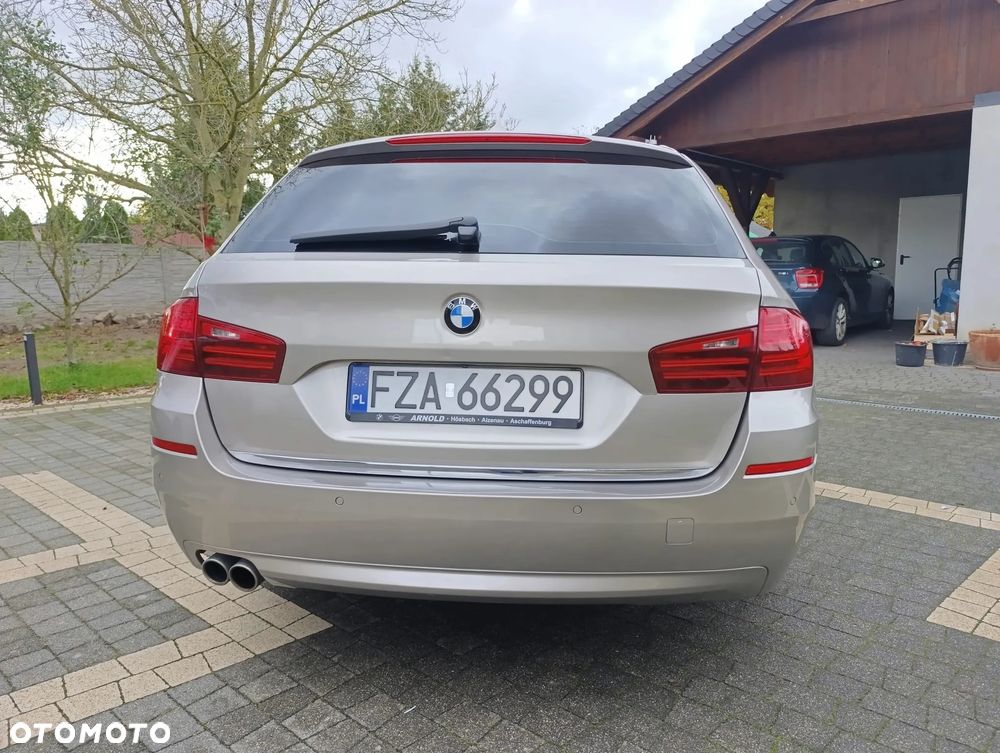 BMW Seria 5 2014 photo 4