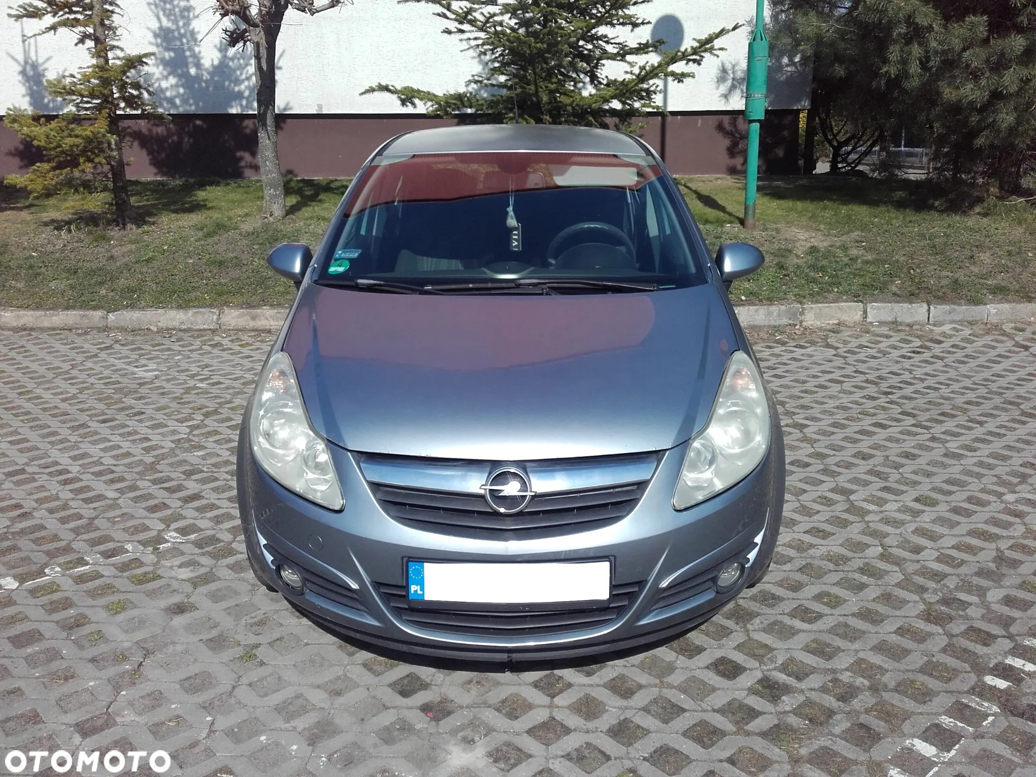 Opel Corsa 1.4 16V Cosmo - 12
