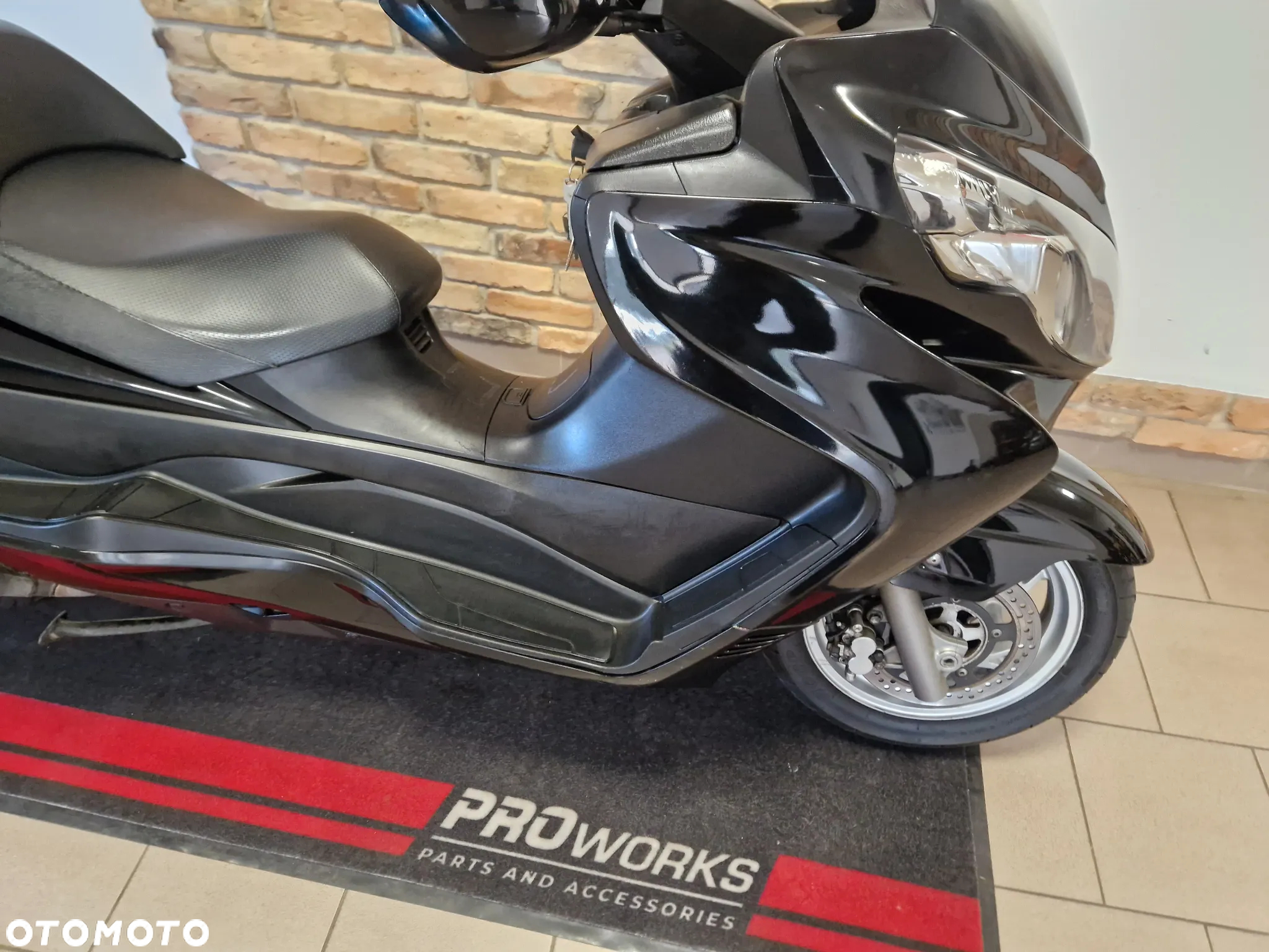 Suzuki Burgman - 32