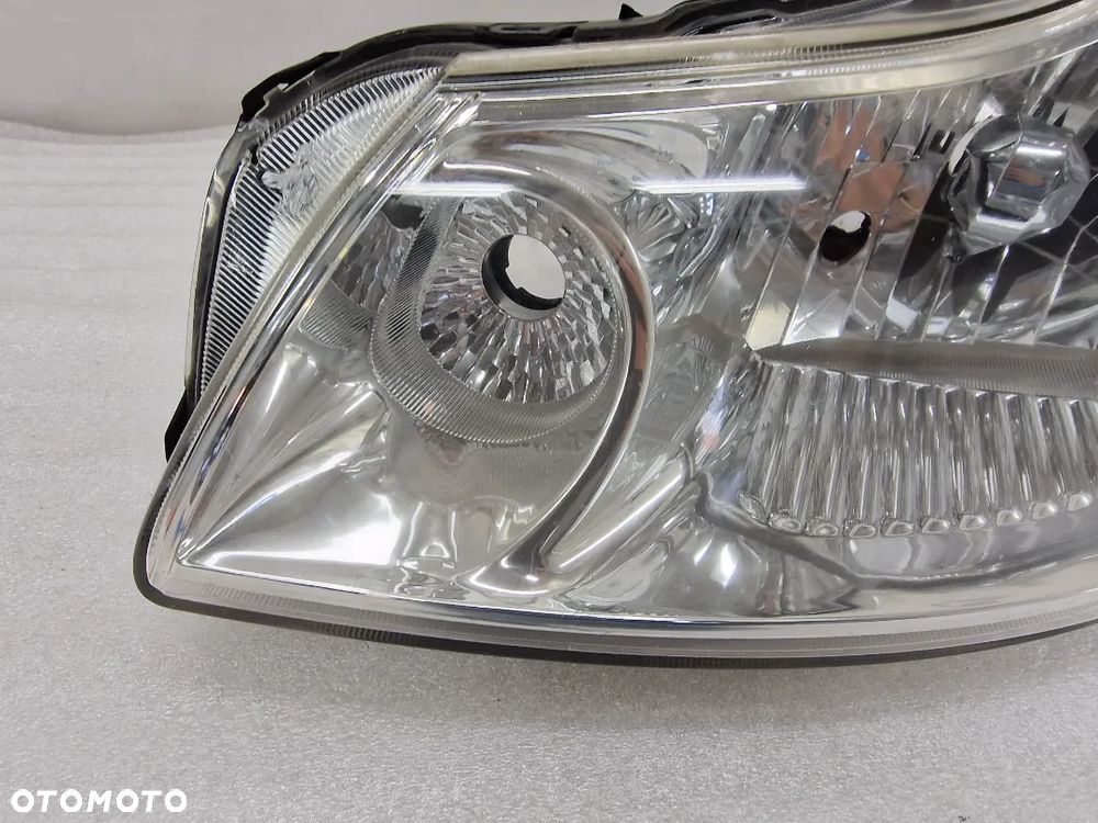 SUZUKI SX4 / FIAT SEDICI ORAZ SEDICI LIFT 06-13 JAPAN LEWA LAMPA PRZEDNIA PRZÓD , NR KOITO 100-59135 , NR AUKCJI LL272 - 3