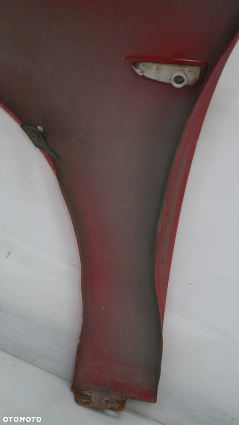 BŁOTNIK PRZEDNI PRAWY OPEL ASTRA J Z50B 2012 - 15