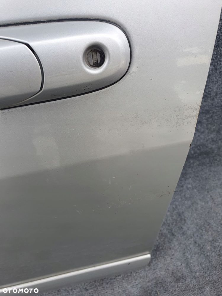 drzwi lewe przednie suzuki liana - 2