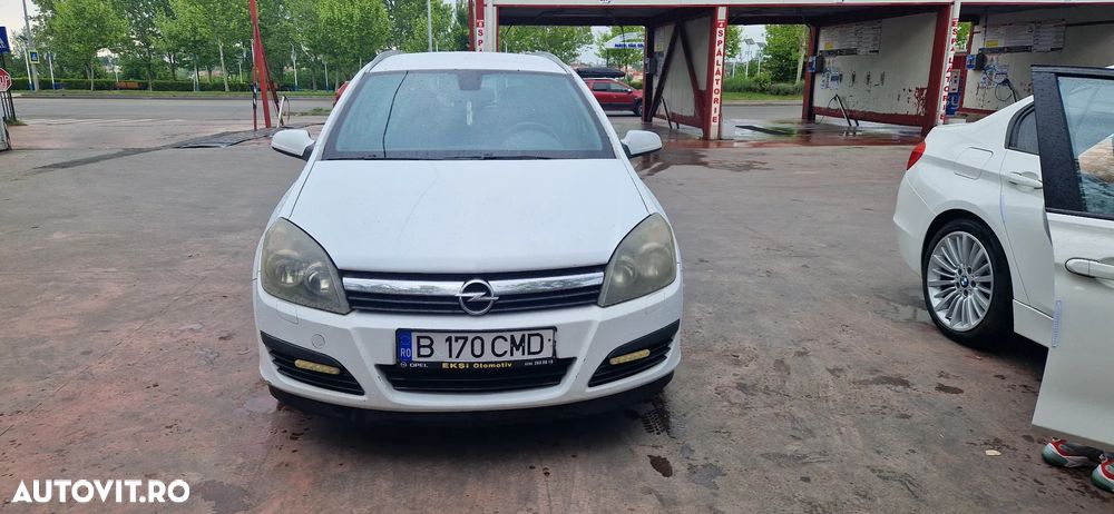 Opel Astra 1.9 CDTI Caravan DPF Cosmo - 1
