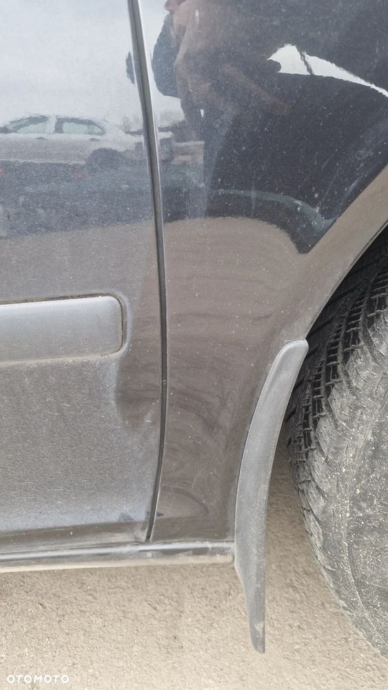 SKODA OCTAVIA II LIFT BŁOTNIK PRAWY PRZÓD 9910 - 2