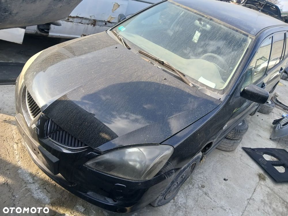 mitsubishi lancer vii x42b maska zderzak lampa grill błotnik drzwi zbiornik paliwa szyba lusterko