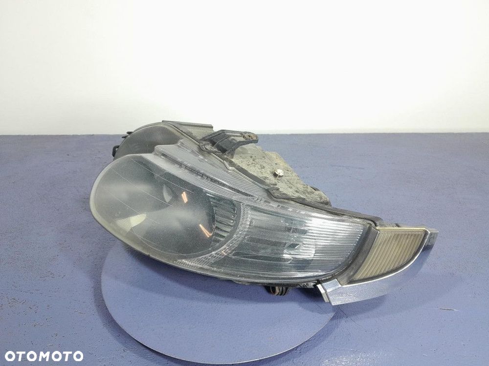 SAAB 9-5 I LIFT REFLEKTOR LAMPA LEWY EU - 2