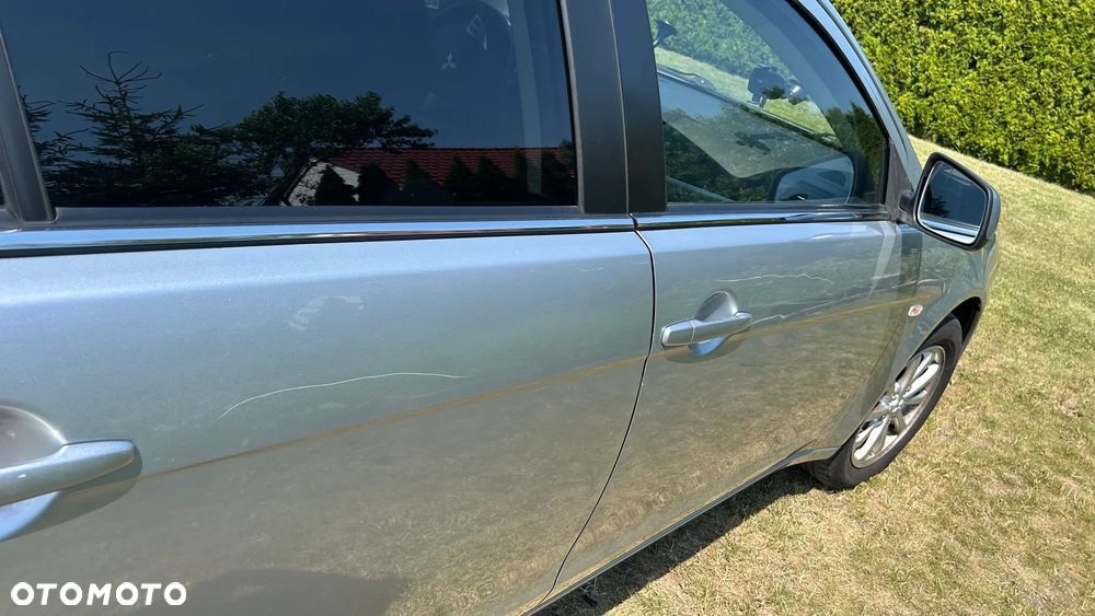 Mitsubishi Lancer 1.5 Inform - 12