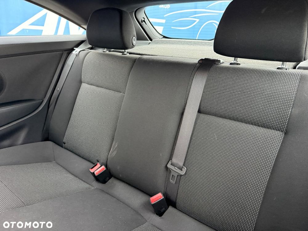 Opel Astra 1.6 Cosmo - 12
