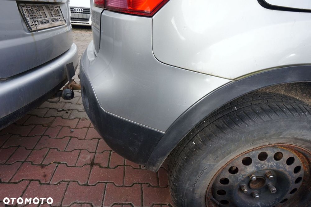 ZDERZAK TYLNY QASHQAI I J10 LIFT KY0  SREBRNY NISSAN 2009-2013 - 6
