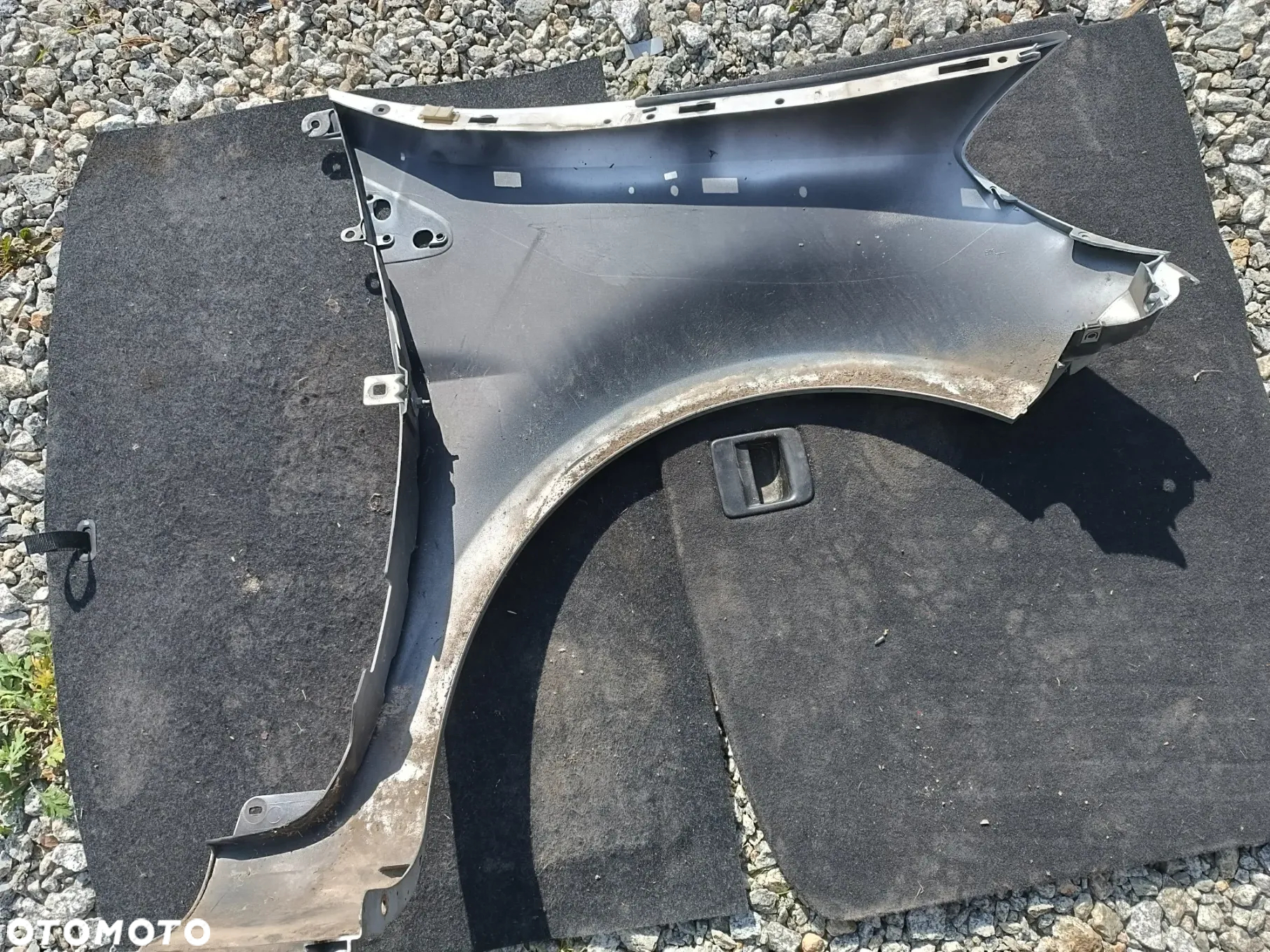 BŁOTNIK LEWY PRZÓD PRZEDNI RENAULT CLIO III LIFT 195 - 2