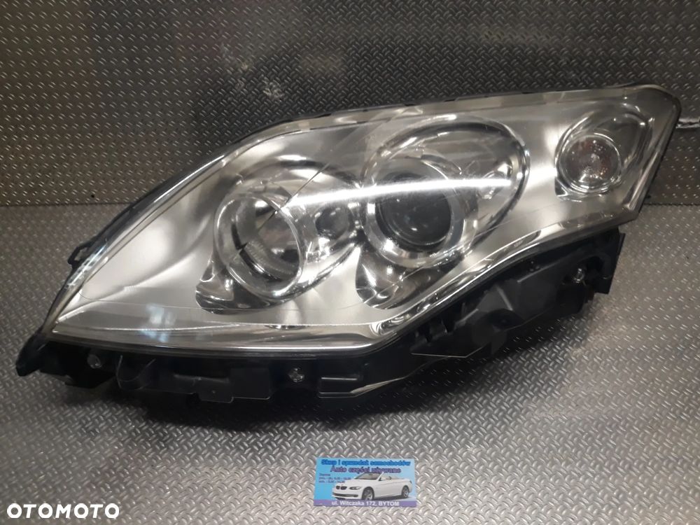 LAMPA LEWY PRZÓD RENAULT LAGUNA III SOCZEWKA 260600033R
