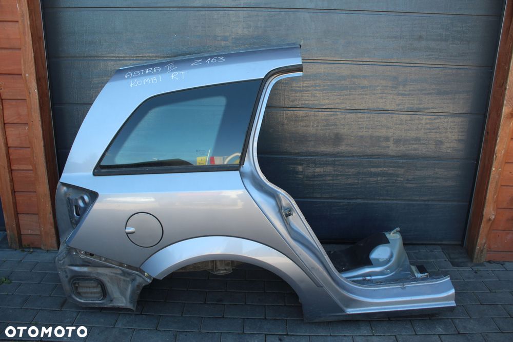 ĆWIARTKA BŁOTNIK PRAWY TYLNY OPEL ASTRA H KOMBI Z163 - 1