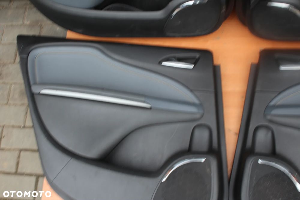 KOMPLET PRZEKŁADKA FOTELE BOCZKI PLASTIKI WYKŁADZINA PASY OPEL ZAFIRA C 7 OSÓB PÓŁSKÓRA - 35