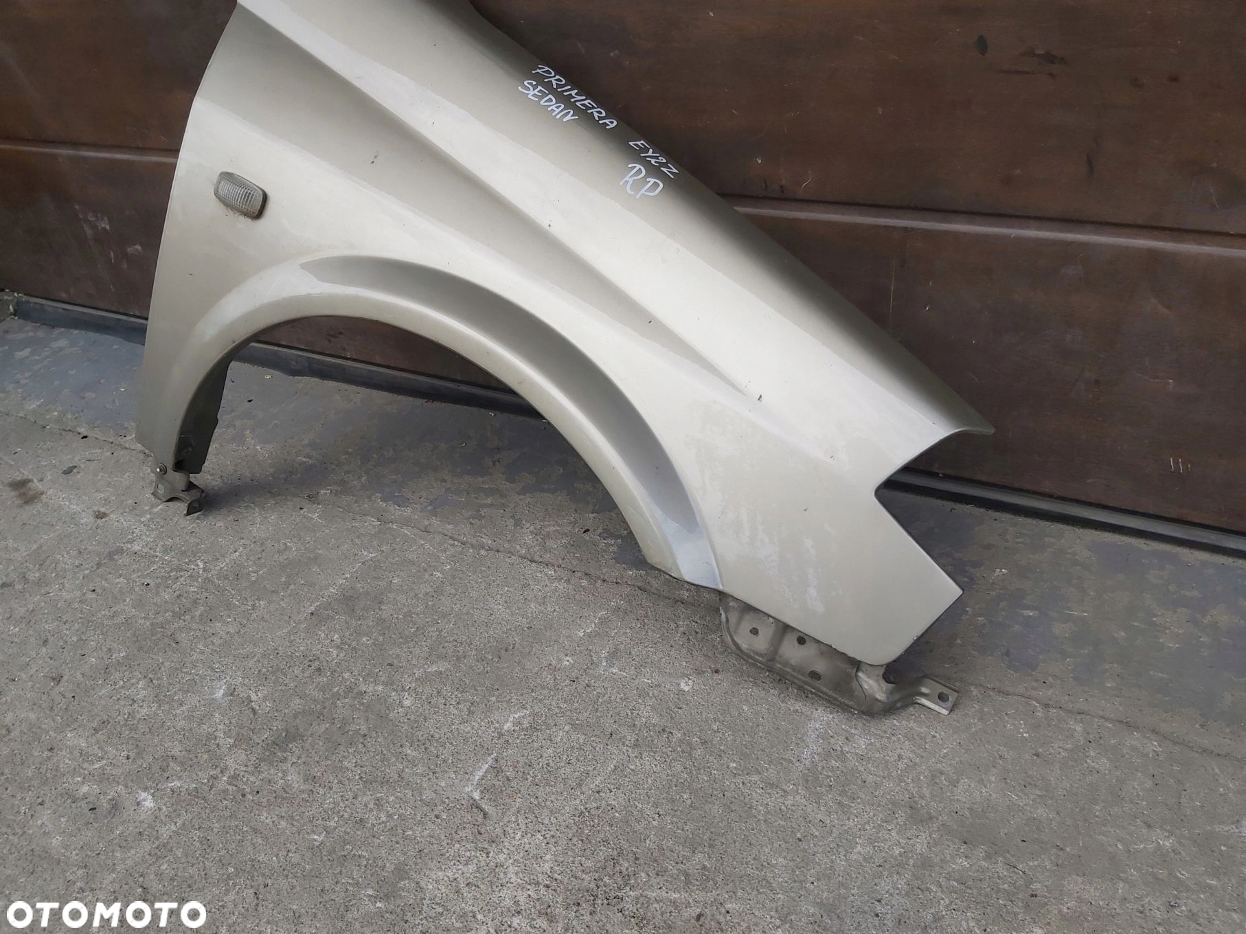 Nissan Primera P12 Błotnik prawy przód EY2 Z - 2