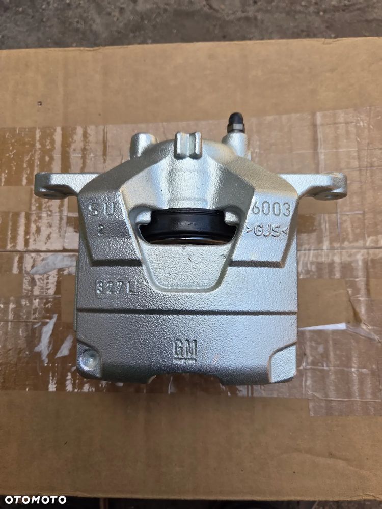 Zacisk hamulcowy lewy przód przedni Opel Astra J Mokka X Zafira C 95522602 1693226880 - 2