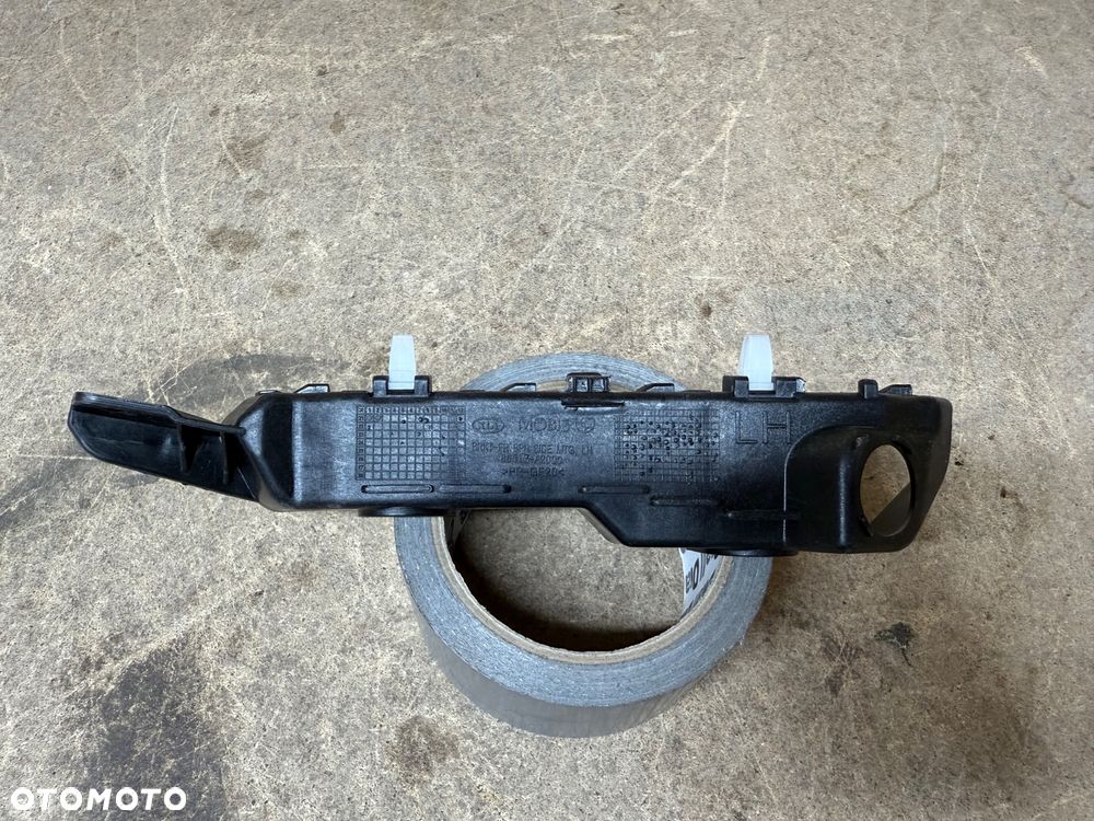 KIA CEED II 12-18 ŚLIZG MOCOWANIE BŁOTNIKA ZDERZAKA LEWY PRZÓD 86513-A2000