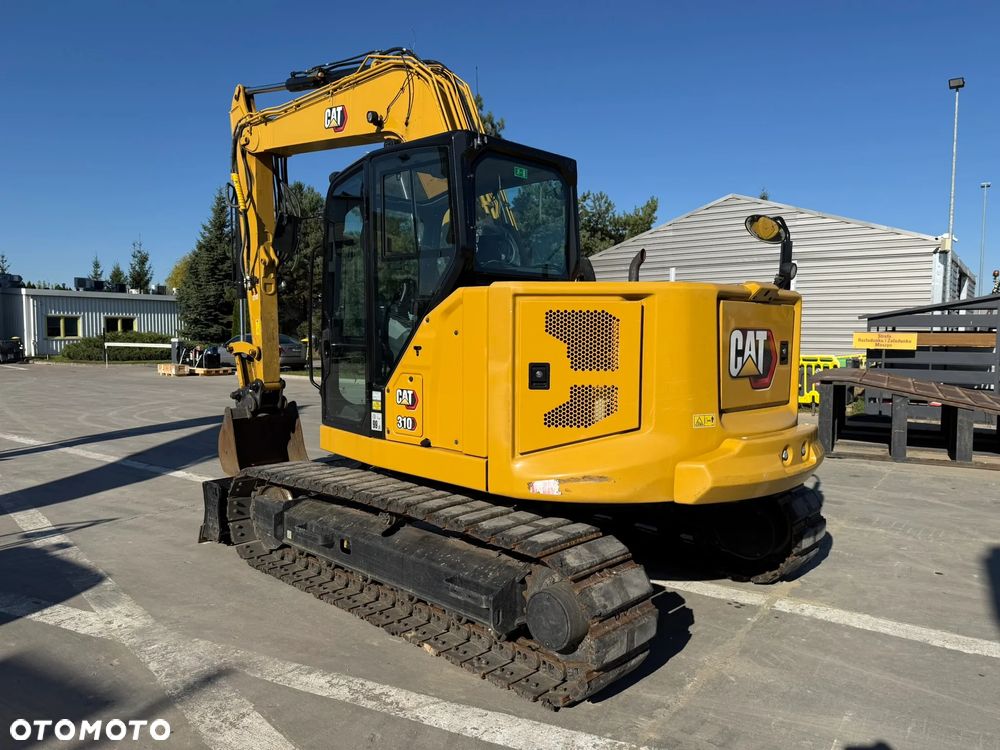Caterpillar 310 - 5