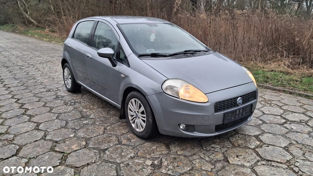 Na części Fiat Grande Punto (199) silnik 1.3 MJTD 16V 90 KM 199A3000 MultiJet lakier 595/A skrzynia maska drzwi klapa szyba fotel kanapa lusterko lampa deska GWARANCJA !!! Przód Tył Zestaw Komplet Drzwi Klapa Zderzak Błotnik Maska Grill Atrapa Szyba Pas Lampa Lusterko Boczki Fotel Kanapa Kokpit Deska Rozdzielcza Przełącznik Włącznik Sterownik Przewody Wiązka Instalacja Moduł Komputer Czujnik Listwa Pompa Alternator Wtryski Głowica Rozrusznik Kompresor Sprzęgło Dwumas Silnik  Skrzynia ABS Klimatyzacji Paliwa Wspomagania Kolektor Turbina Przepustnica Zawór Chłodnica Koło Hak Belka Sanki Zawieszenie Mcpherson Półoś Amortyzator Wydech Tłumik Zacisk Most - 2