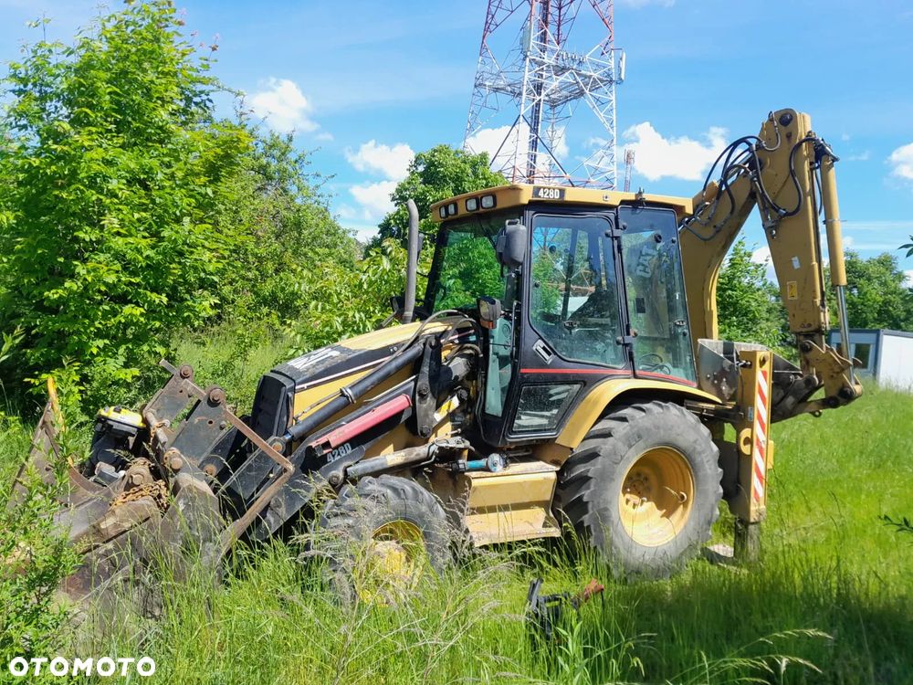 Caterpillar CAT 428D - 1
