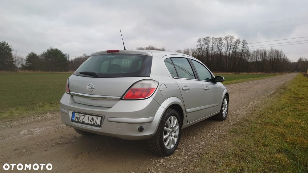 Opel Astra 1.6 Cosmo - 9