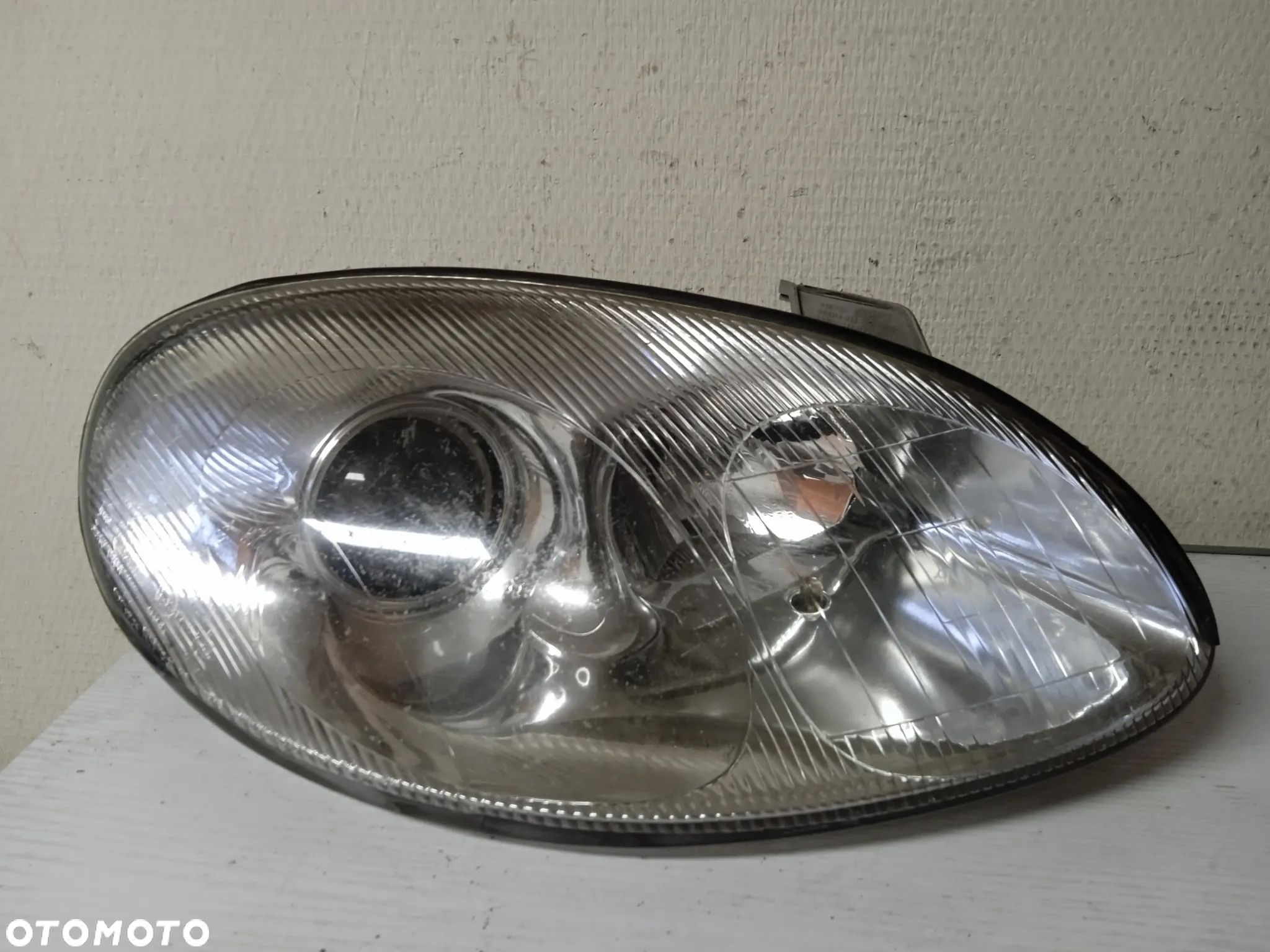 REFLEKTOR DAEWOO LEGANZA PRAWY - 1