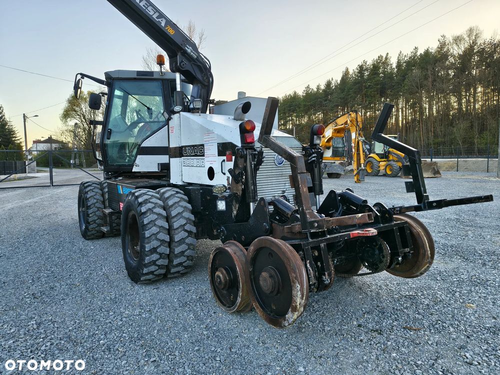 Caterpillar UNAC 300RR Mulczer kolejowy Liebherr atlas dwudrogowy zw - 11
