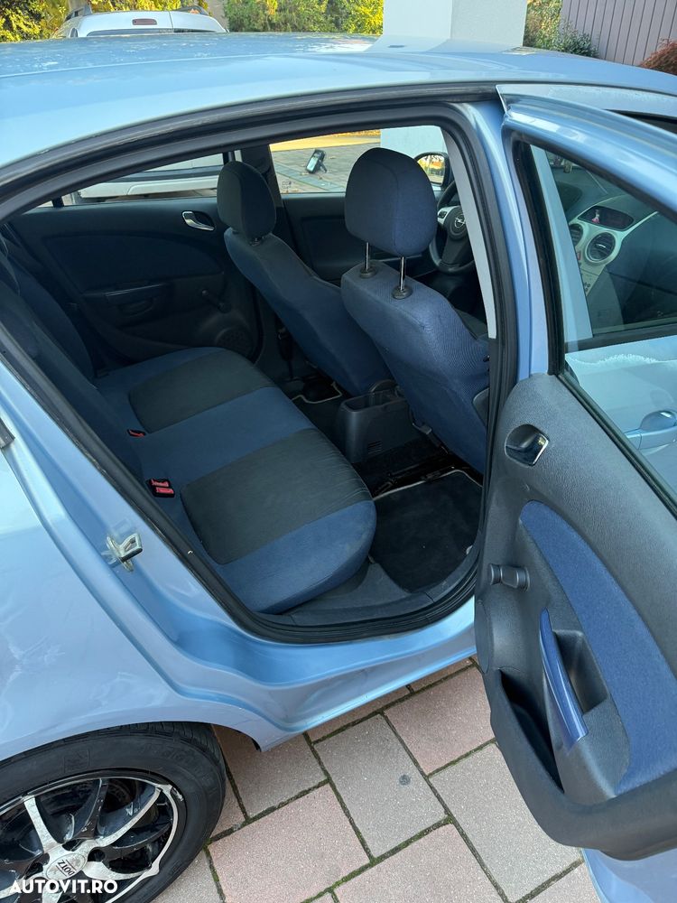 Opel Corsa 1.2i Cosmo - 10