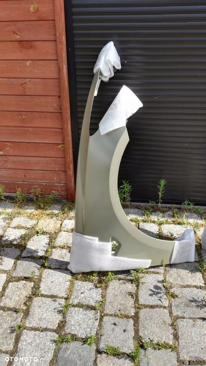TESLA 3 III PRZEDNI BLOTNIK PRAWY LUB LEWY NOWY