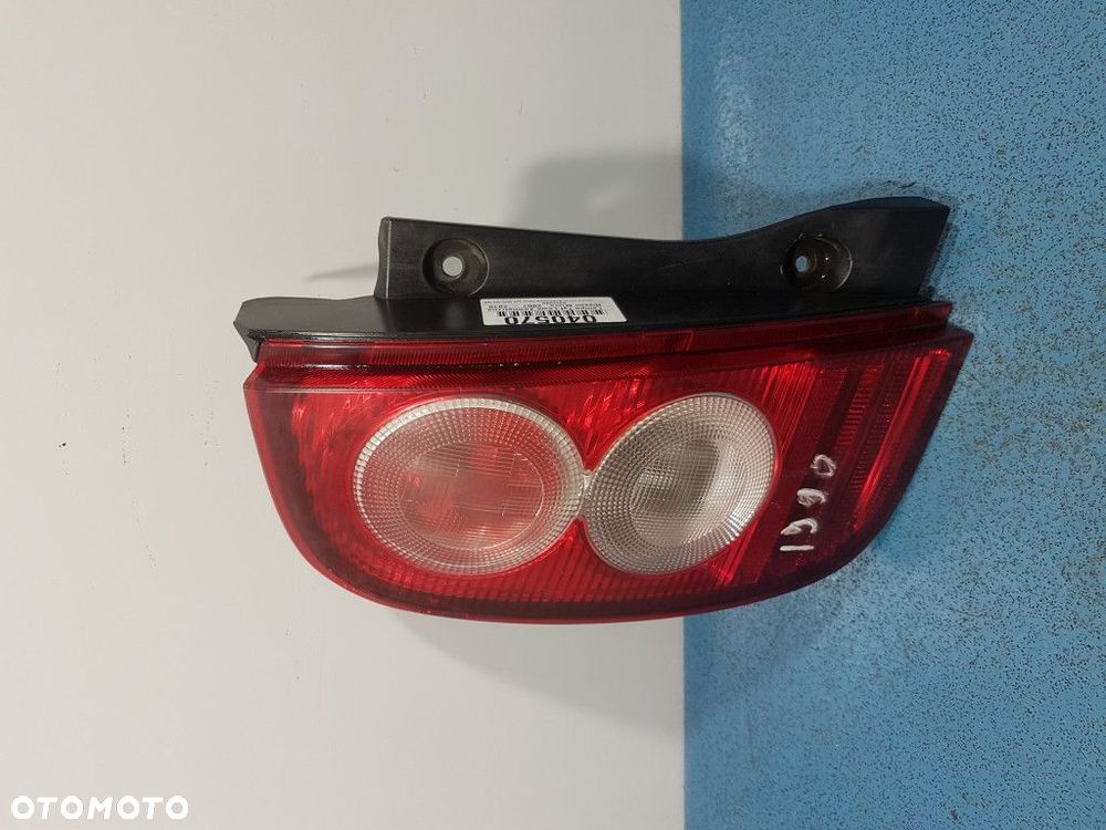 NISSAN MICRA K12C LIFT LAMPA TYŁ LEWA ZEWNĘTRZNA - 1