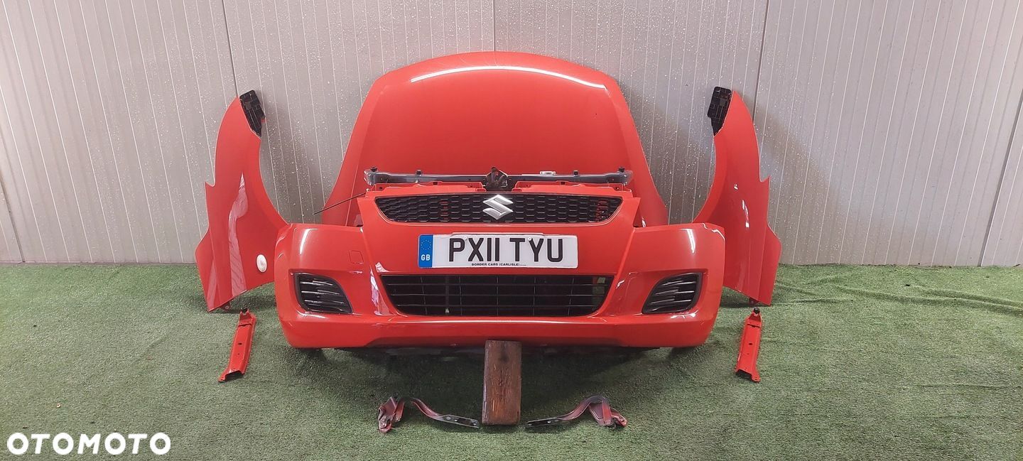 BŁOTNIK LEWY PRZÓD SUZUKI SWIFT 10-17 LAK ZCF - 1