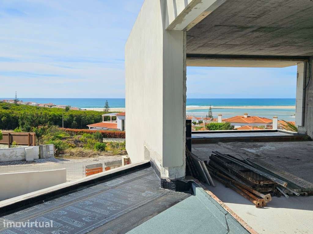 Moradia vista lagoa, praia e mar perto de vários campos de golfe - Grande imagem: 5/26