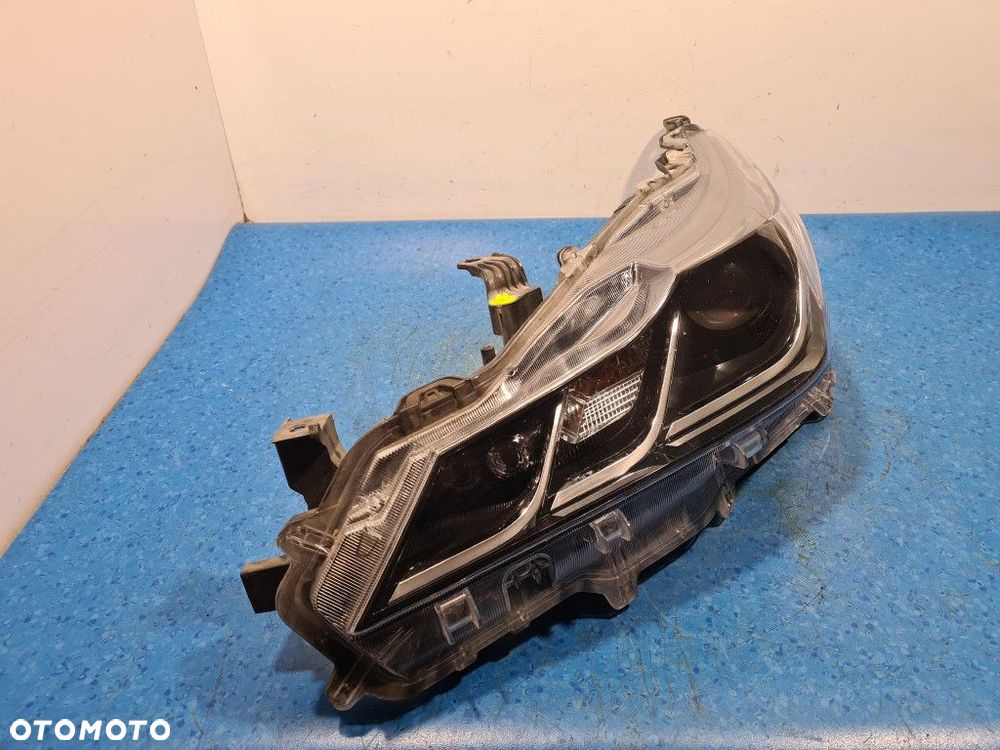 TOYOTA COROLLA E21 REFLEKTOR LEWY 81150-02T30-00 - 2