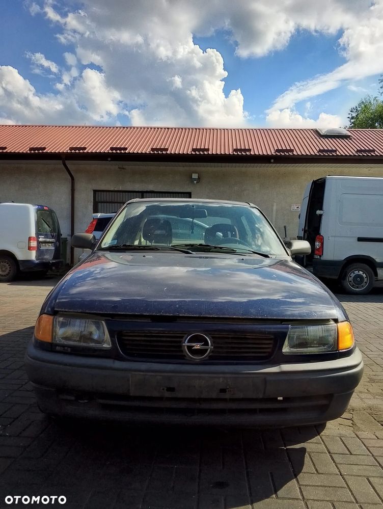 Opel Astra F (94-02r.) 1.6B 74KM. Silnik X16SZR Skrzynia F13 W374.Cały na części. GWARANCJA !!! Przód Tył Zestaw Komplet Drzwi Klapa Zderzak Błotnik Maska Grill Atrapa Szyba Pas Lampa Lusterko Boczki Fotel Kanapa Kokpit Deska Rozdzielcza Przełącznik Włącznik Sterownik Przewody Wiązka Instalacja Moduł Komputer Czujnik Listwa Pompa Alternator Wtryski Głowica Rozrusznik Kompresor Sprzęgło Dwumas Silnik Skrzynia ABS Klimatyzacji Paliwa Wspomagania Kolektor Turbina Przepustnica Zawór Chłodnica Koło Hak Belka Sanki Zawieszenie Mcpherson Półoś Amortyzator Wydech Tłumik Zacisk Most - 2