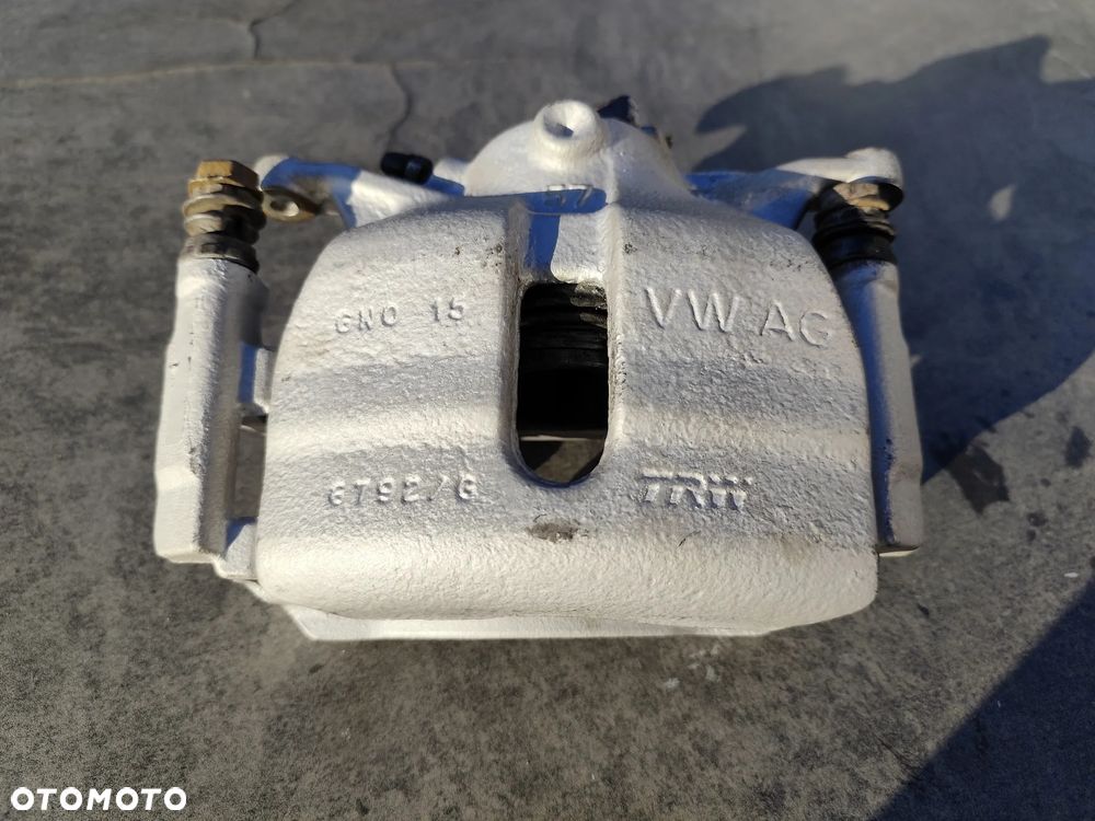 OEM zacisk hamulcowy VW z jarznem przód TRW 6792/G - 1