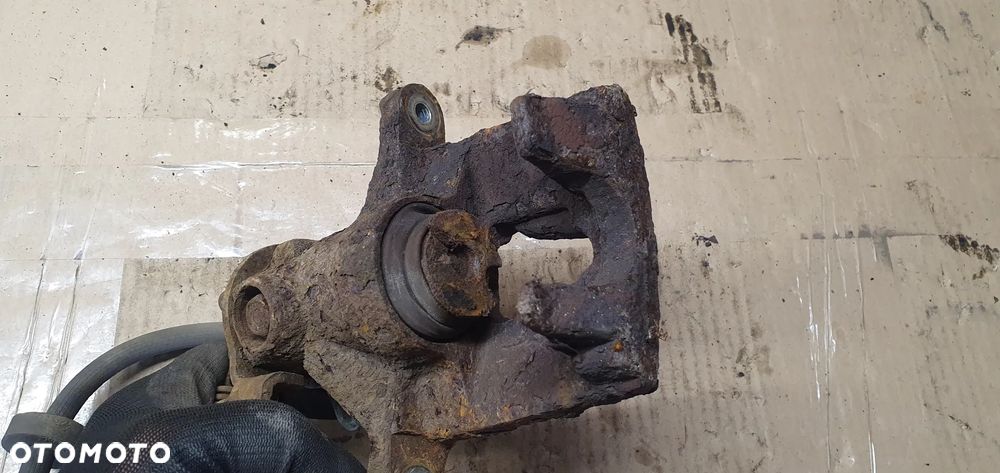 Zacisk hamulcowy prawy tył Ford Mondeo MK3 - 6