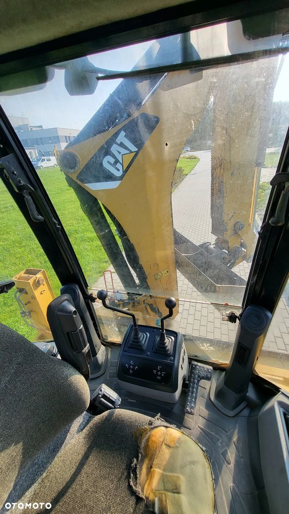 Caterpillar 428E - 7