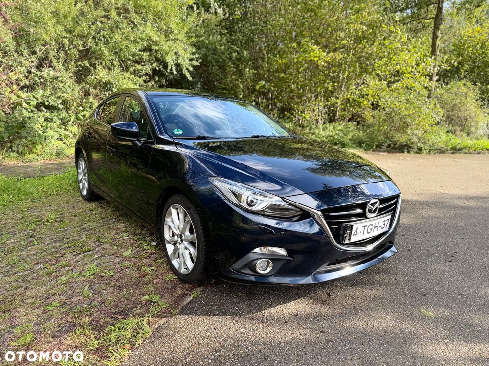 Mazda 3 2014 photo 3