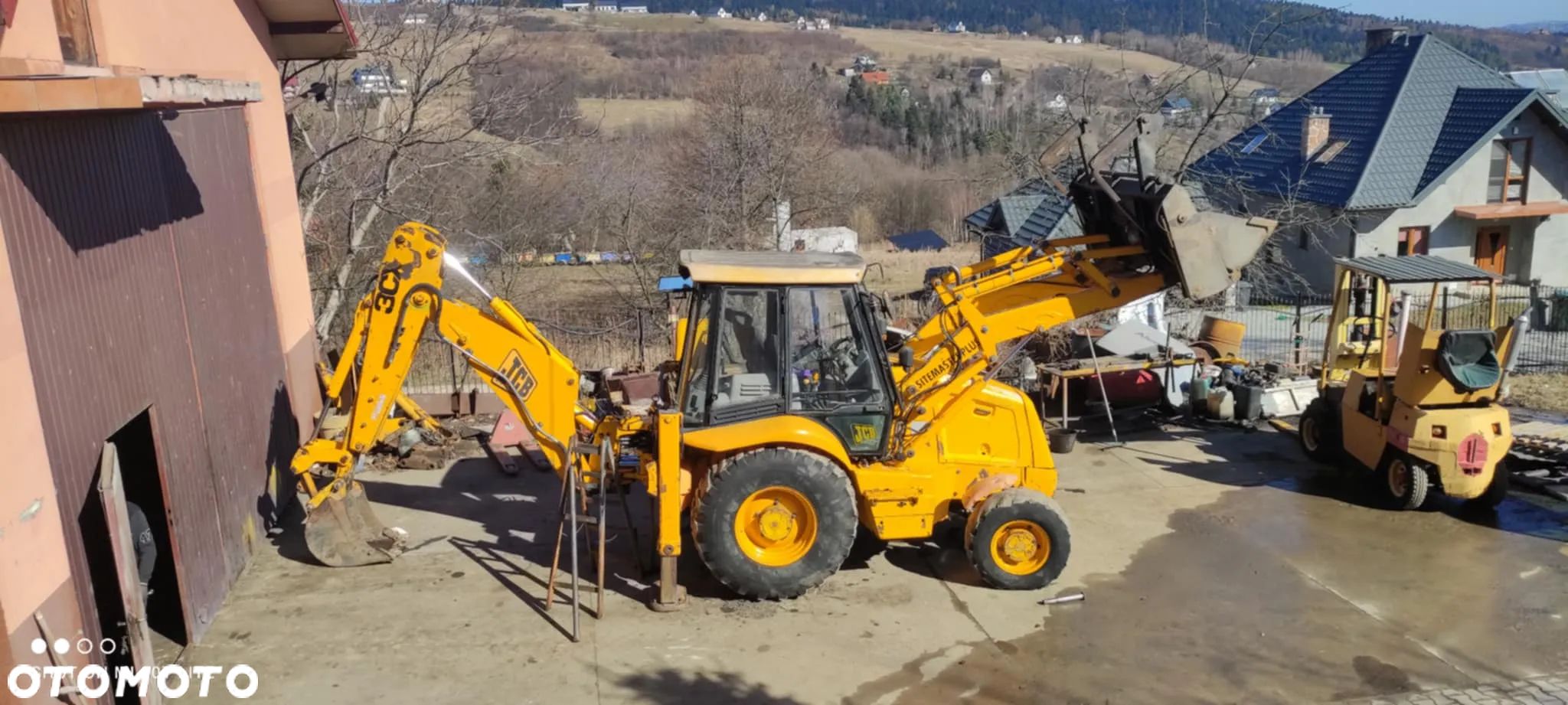 JCB koparko-ładowarka KOMATSU WB97 jcb 3cx - 1