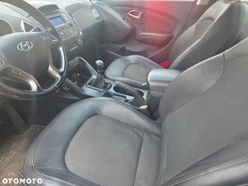 Hyundai ix35 blue 1.6 2WD Finale Gold - 12