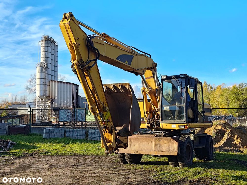 Caterpillar M318 - 6