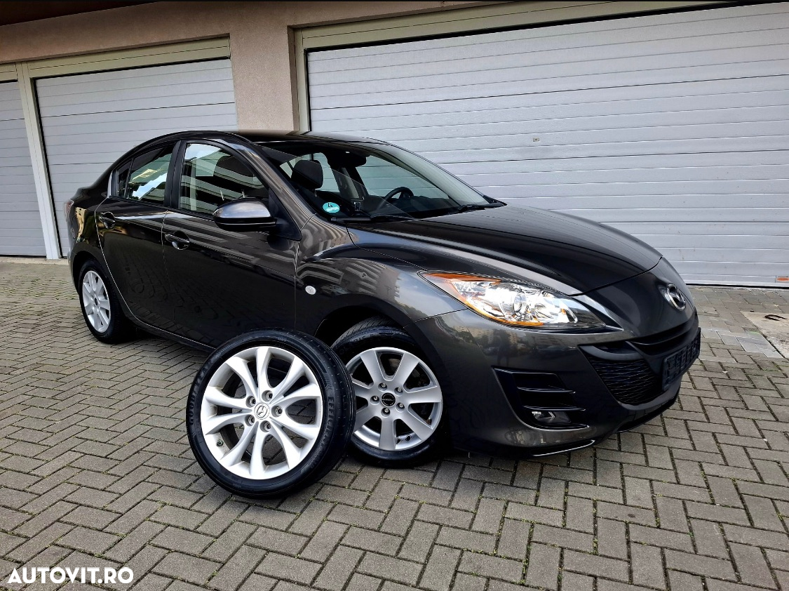 Mazda 3 2.0 MZR DISI Exclusive-Line - 11