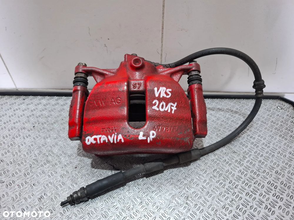 Zacisk hamulcowy lewy przód Skoda Octavia III kombi VRS 2017 rok 2,0 TDI - 1