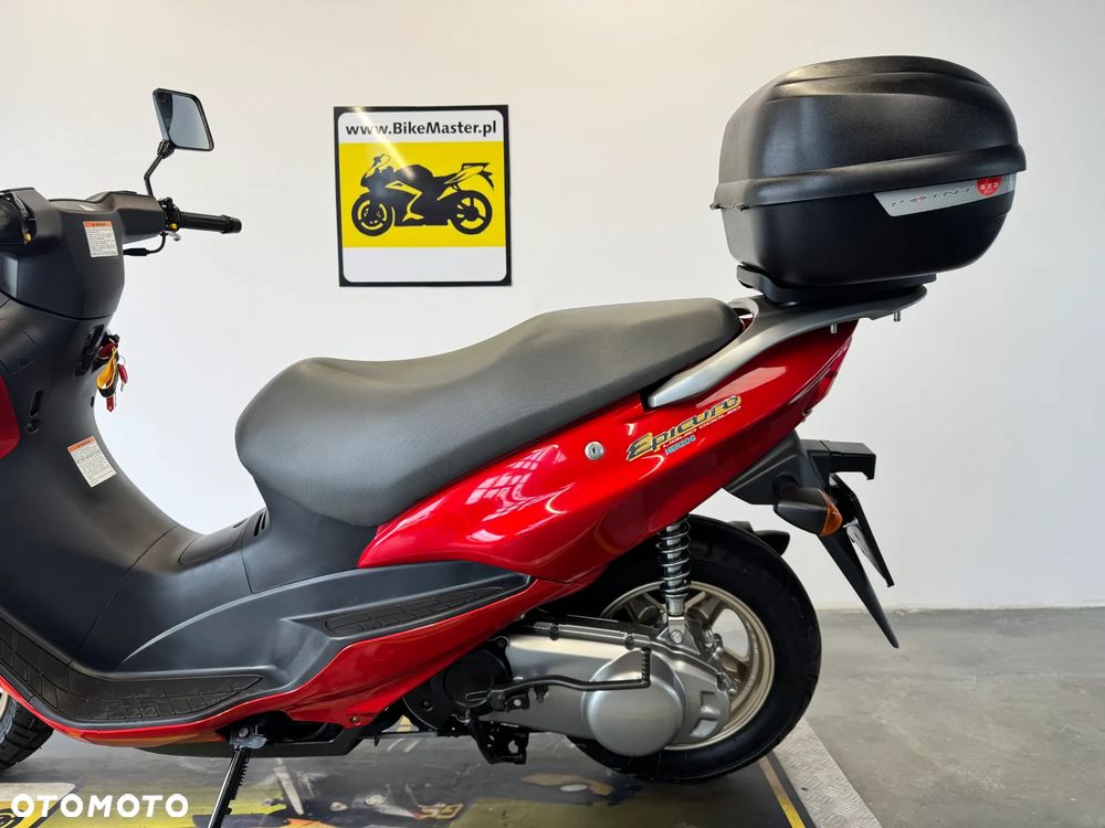 Suzuki Inny - 27