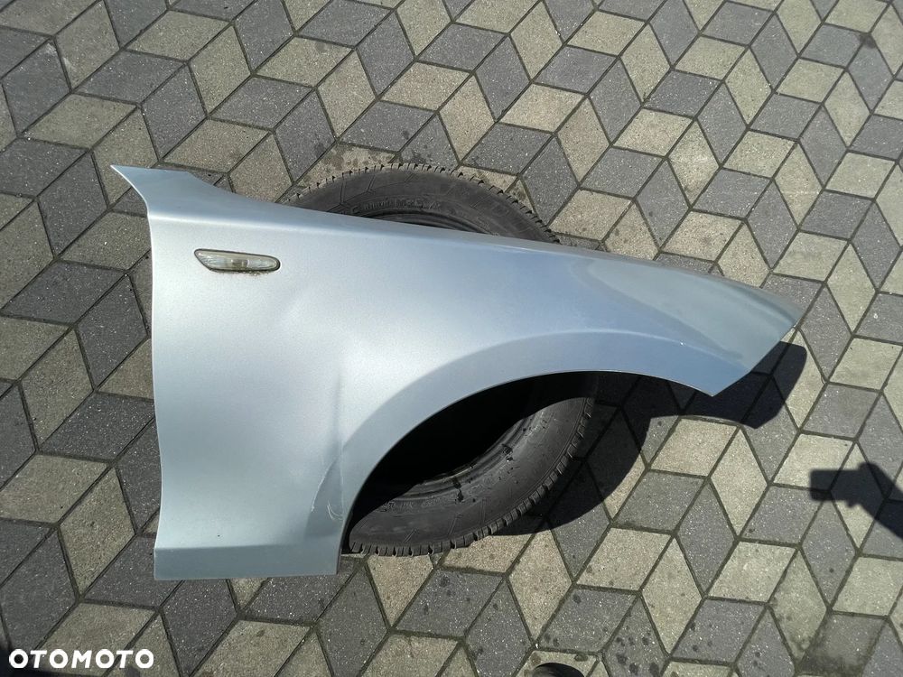 Bmw E87 Błtonik Prawy titansilber - 1