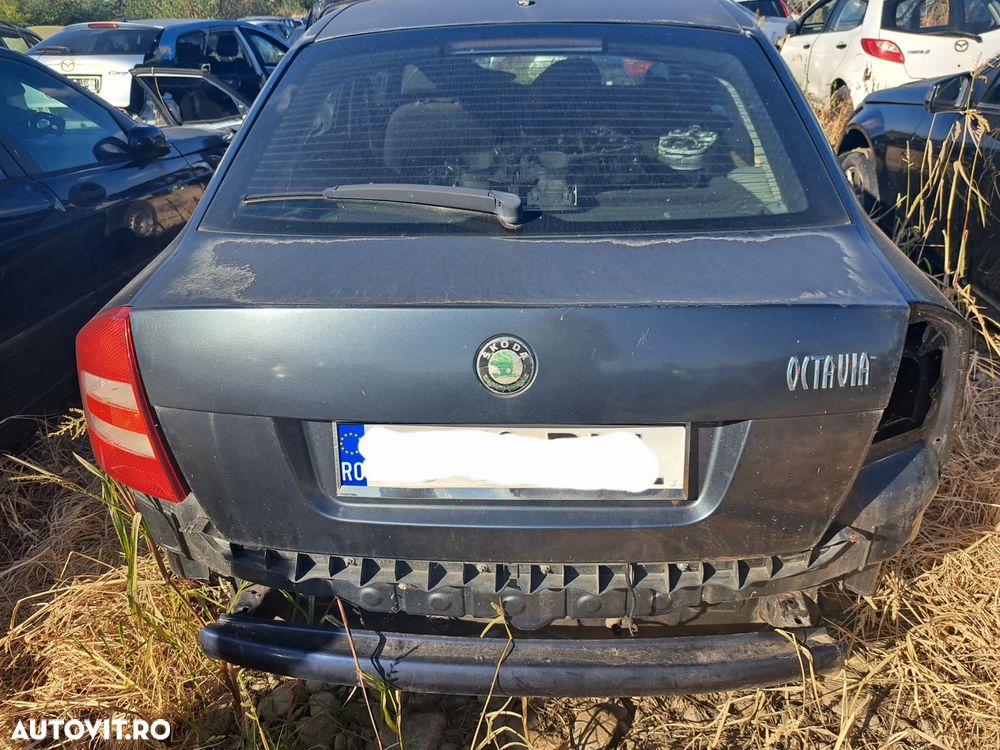 Capota portbagaj Usa stanga dreapta fata spate Oglinda stanga dreapta exterioara Originale Skoda Ocatavia 2 2005-2013 gri - 1