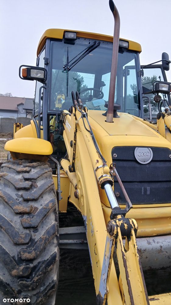 New Holland LB 115 - 19